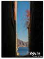 View between houses to the Aegean sea